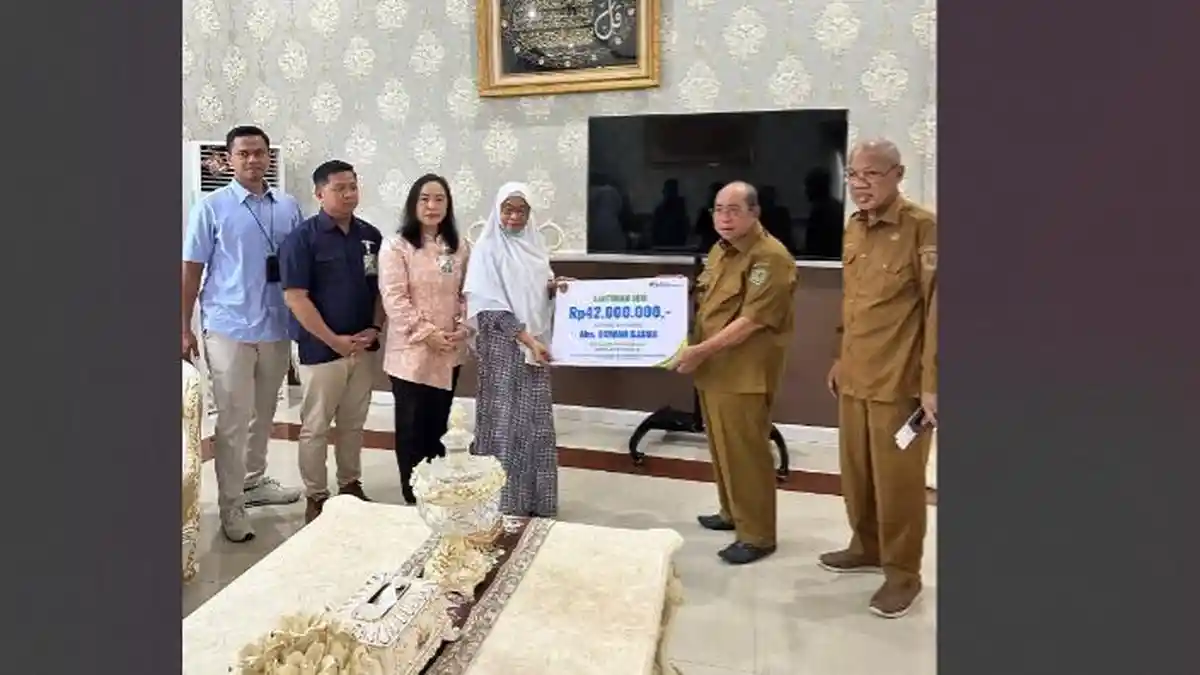 Wali Kota Gorontalo Secara Simbolis Serahkan Santunan JKM dari BPJS Ketenagakerjaan - Tribun Gorontalo